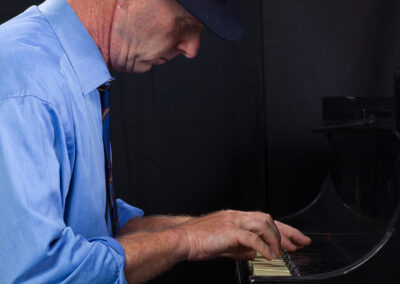 John Finbury of Green Flash Music on Piano Photo